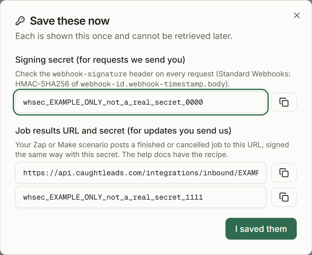 The Save these now dialog in CaughtLeads showing a signing secret, a job results URL and its secret, with example values